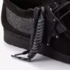 Andersson Bell X Wallabee svart broderi