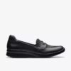 Ellowyn Penny slip-on-sko i svart skinn for kvinner