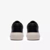 Hollyrose Zip-sneakers i svart skinn for kvinner