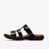 Kitly Pearl – flate sandaler i svart lakkskinn for damer