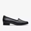 Krystine Lily slip-ons i svart skinn for damer