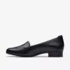 Krystine Lily slip-ons i svart skinn for damer