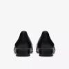 Krystine Lily slip-ons i svart skinn for damer