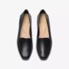 Krystine Lily slip-ons i svart skinn for damer