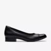 Krystine May slip-on-sko i svart skinn for damer