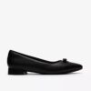 Natalyn Trim slip-ons i svart skinn for damer
