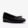 Natalyn Trim slip-ons i svart skinn for damer