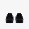 Natalyn Trim slip-ons i svart skinn for damer