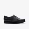 Wallabee™-sko i svart skinn for eldre barn